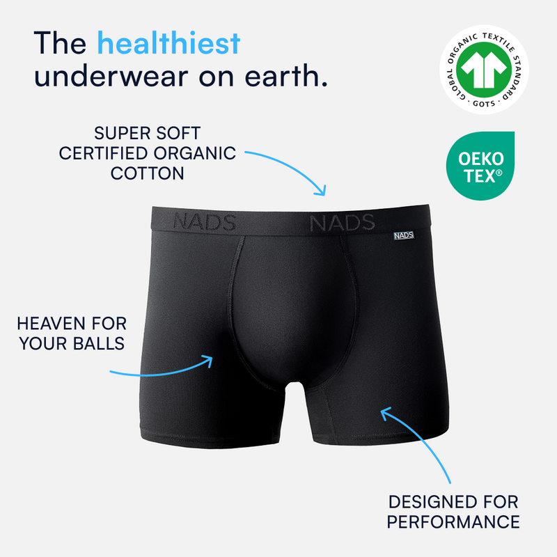 Black NADS trunk underwear with overlay text highlighting organic cotton softness, performance design, and GOTS and OEKO-TEX certifications