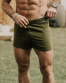 Man Standing with his hands on the waistband of an Organic Cotton Boxer in Green 