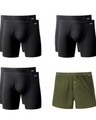 Eight pairs of black boxer briefs and one green shorts with 'NADS' branding on a white background.
